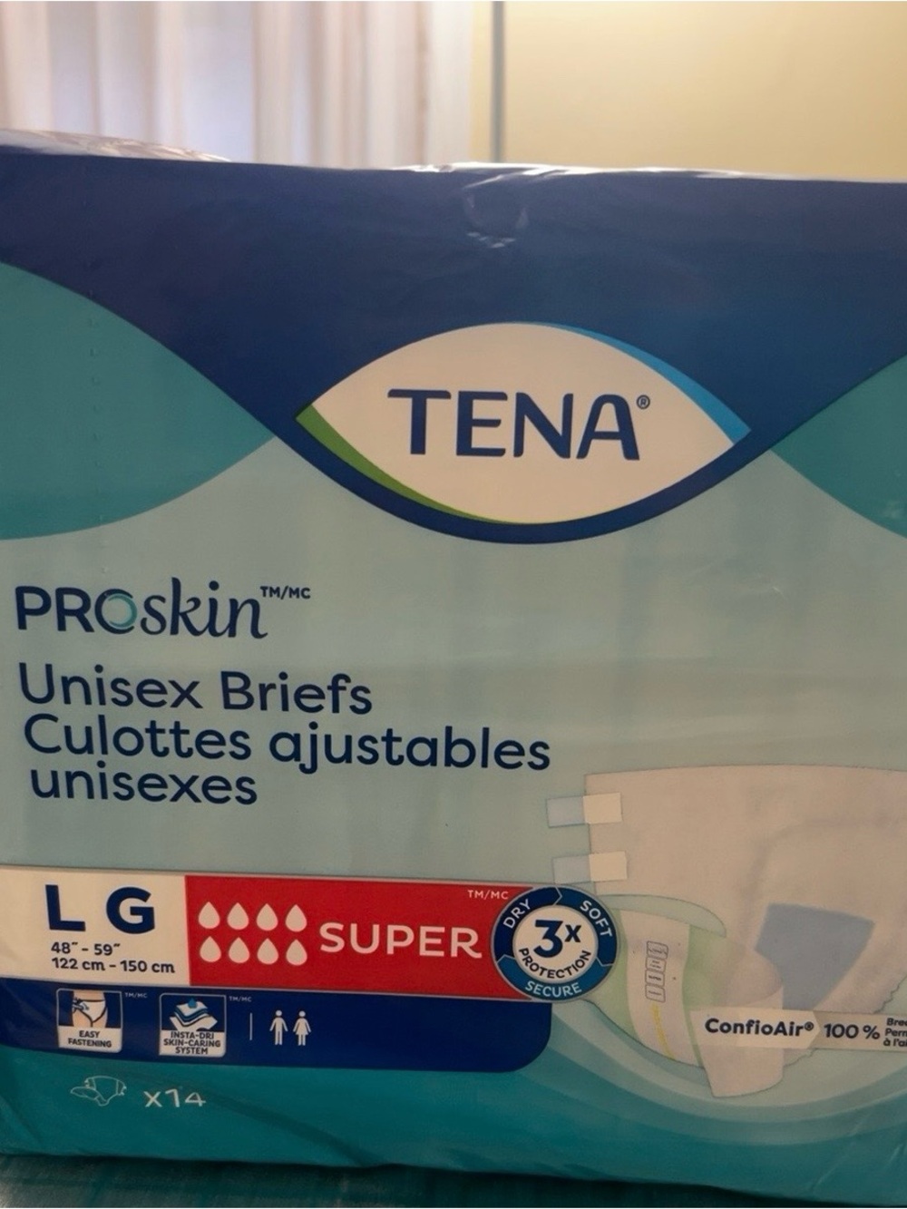 TENA ProSkin Unisex Briefs - Light Blue/Teal Packaging